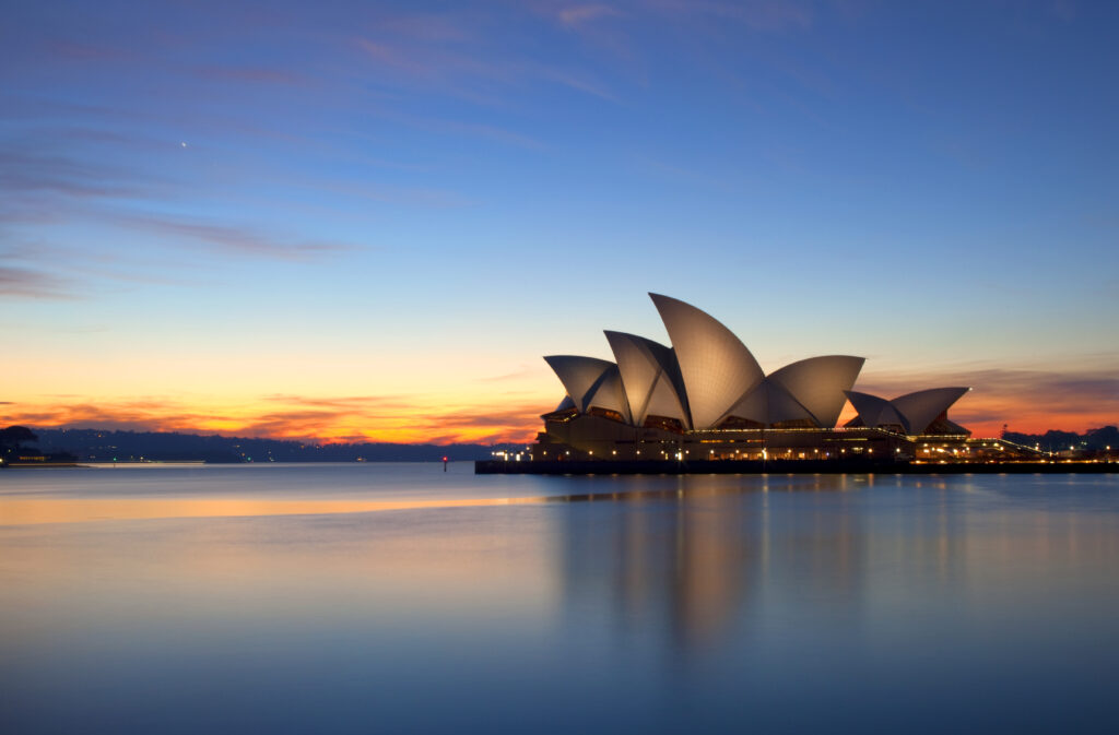 dawn breaks over the sydney opera house